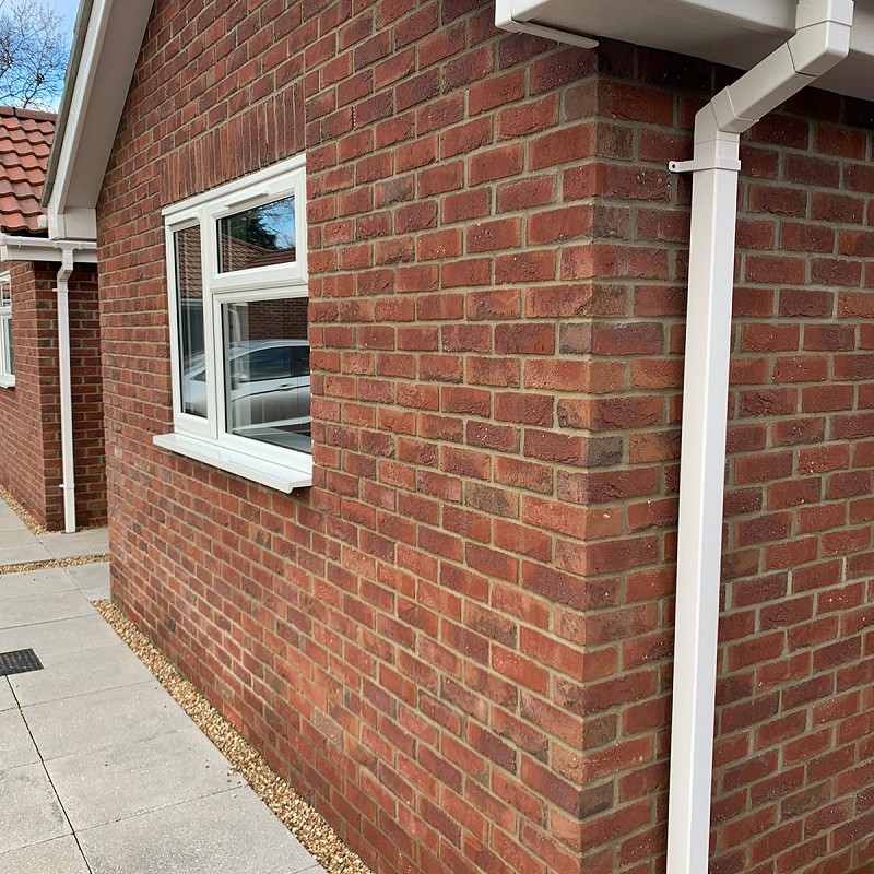 Bungalow showcasing the Traditional Brick & Stone Alton Red Multi