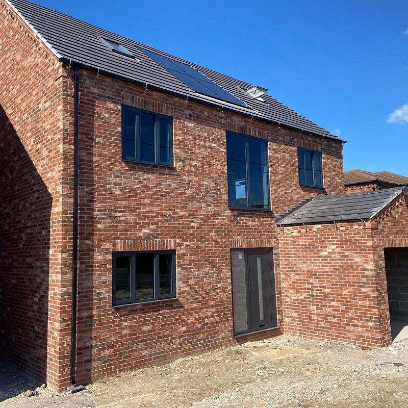 self build house constructed in the Augusta Red Multi