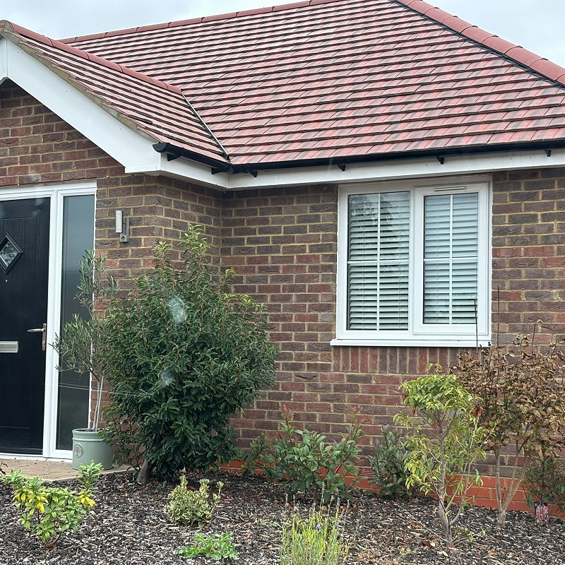 New bungalow constructed in the traditional brick and stone bedfordshire mixture brick.