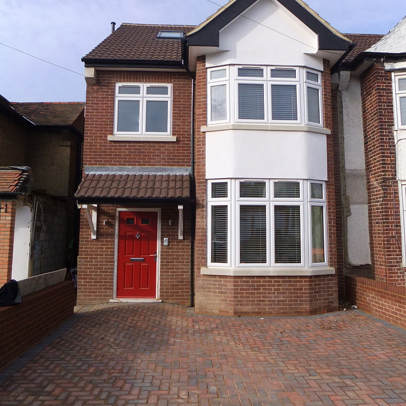 House constructed in the Burgundy Red brick.