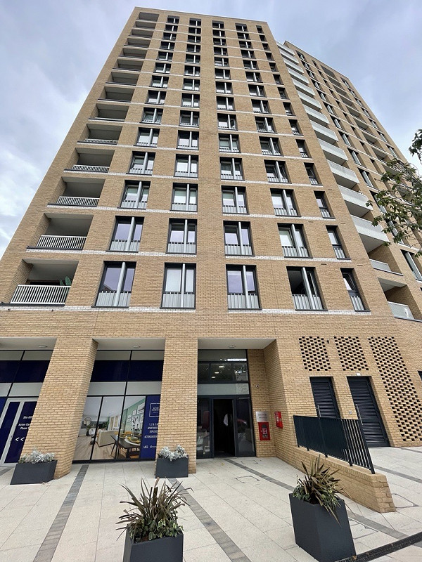 Block of flats constructed in the Cambourne Buff Brick.