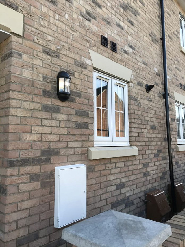 Cast Stone cill with the Grantchester Blend brick.