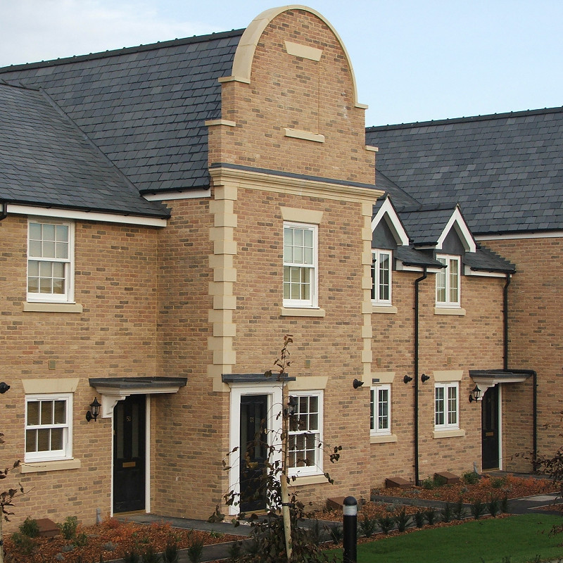 Grantchester Blend brick complemented by cast stone features.