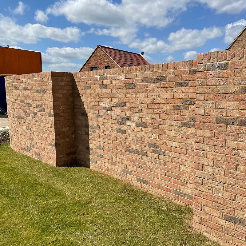 Brick wall constructed in the Grantchester Blend brick.