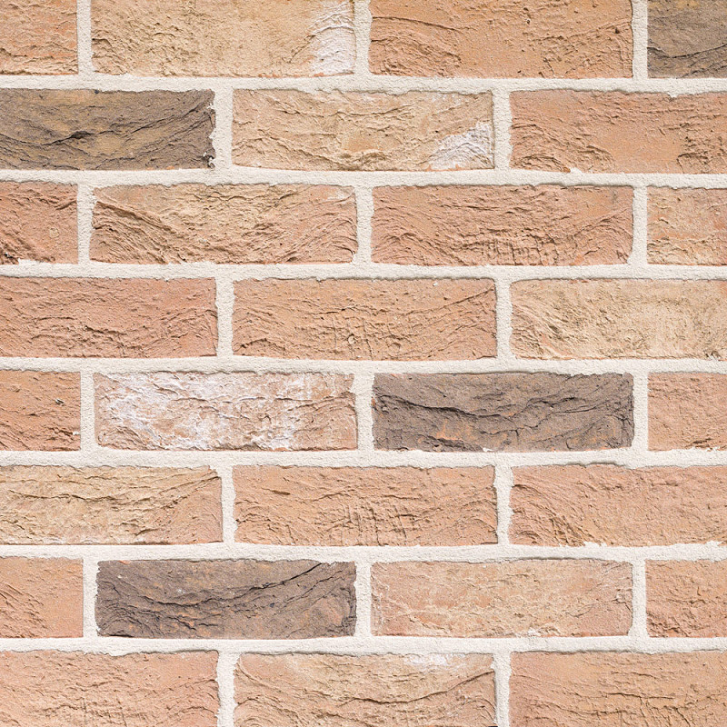 Close-up panel of Grantchester Blend buff/pink textured stock brick.