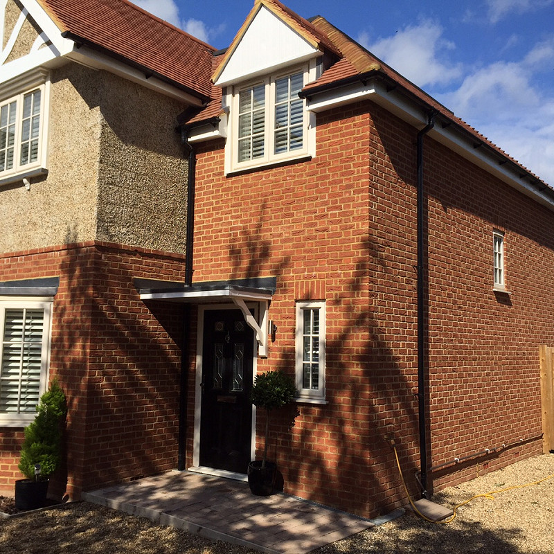 new build house constructed in hastings red.