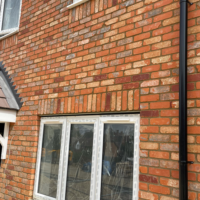 close up of a reclaimed style tumbled brick.