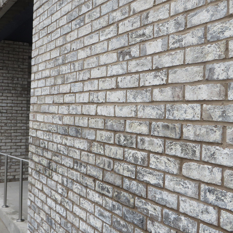 close up of a grey multi brick.