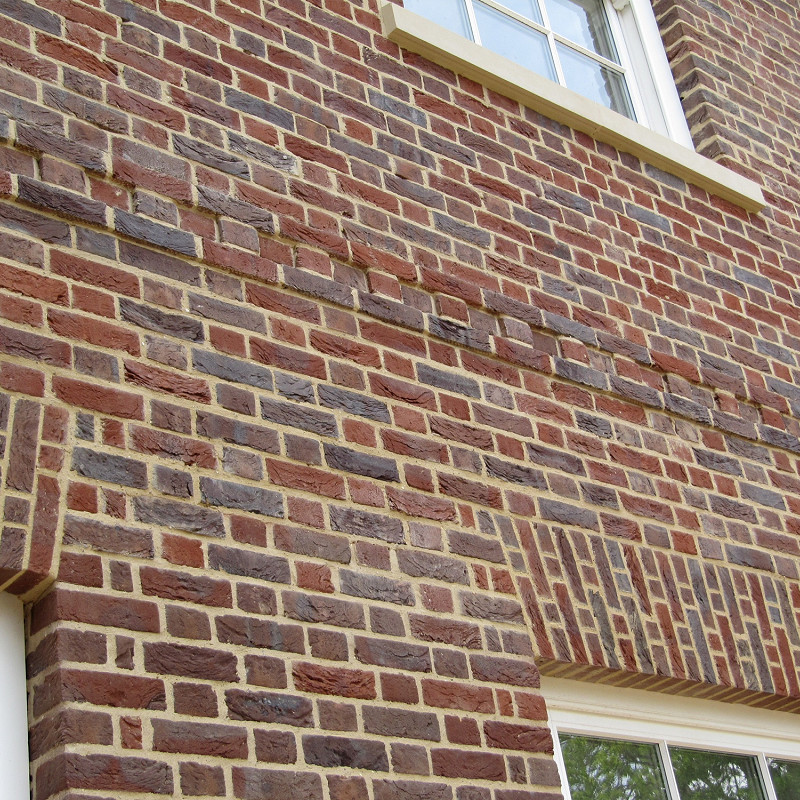 close up of brickwork featuring brick arches.