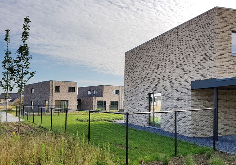 Residential project constructed in a grey linear brick
