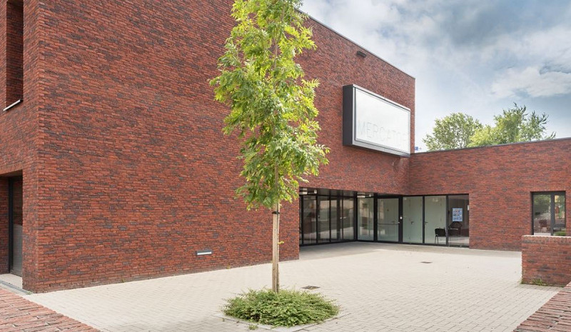 Commercial build showcasing a red linear brick.