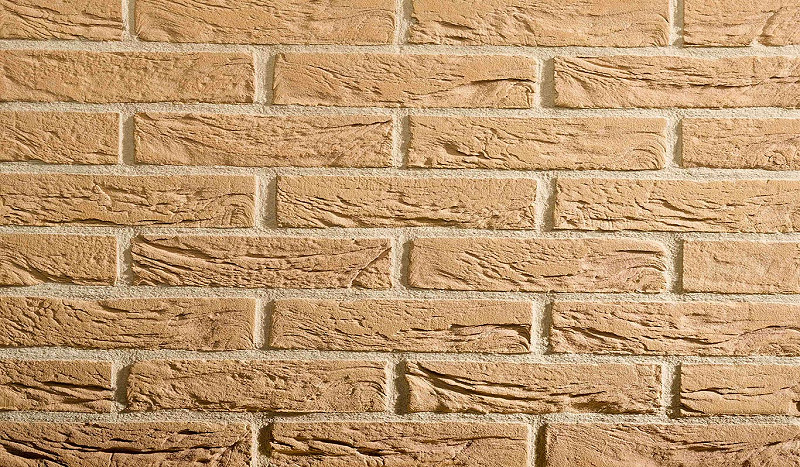 close up of texture of buff linear brick