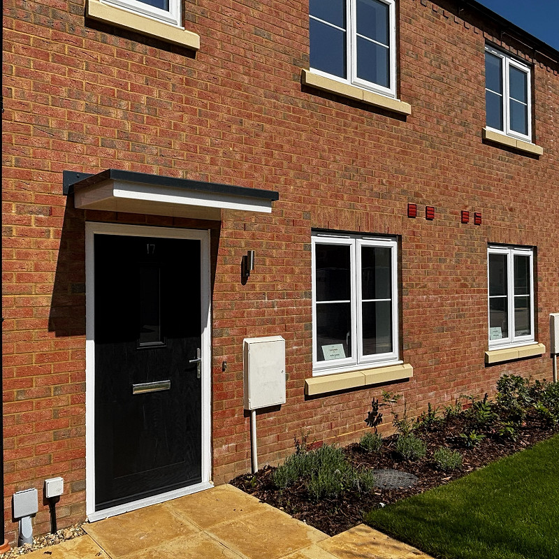 New Town Red Multi Wirecut bricks with cast stone cills.