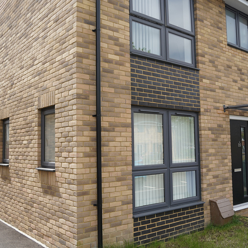 buff brick house.