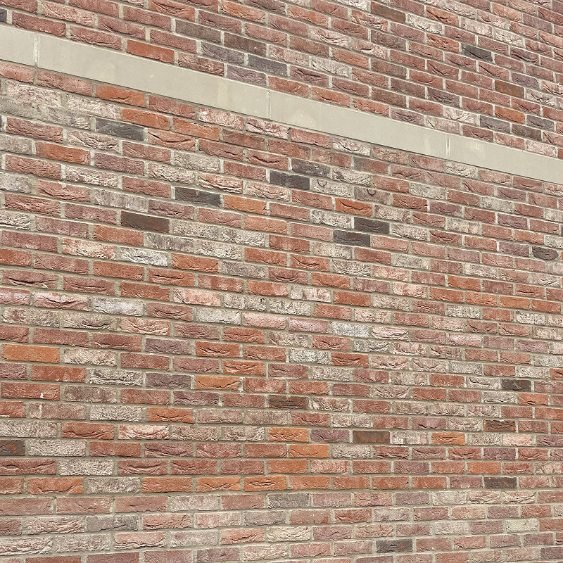 Close up of brickwork and cast stone detailing.