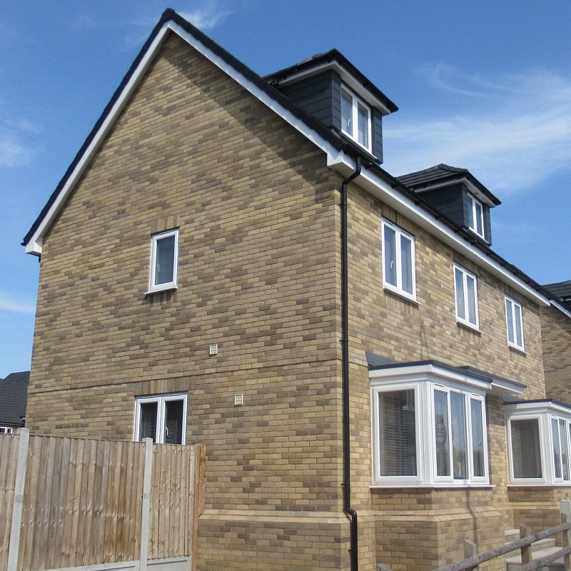 New build house constructed with Buff Multi soft mud bricks.