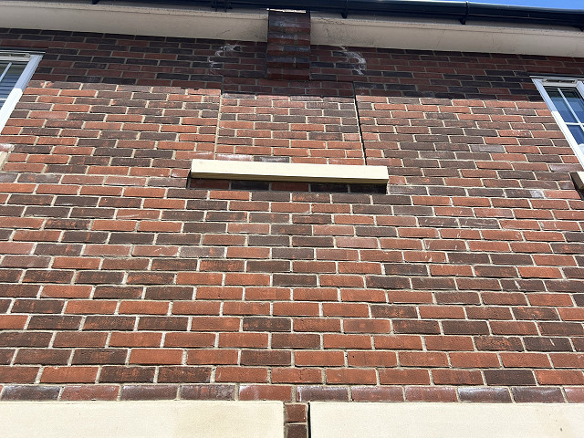 Red brickwork with efflorescence