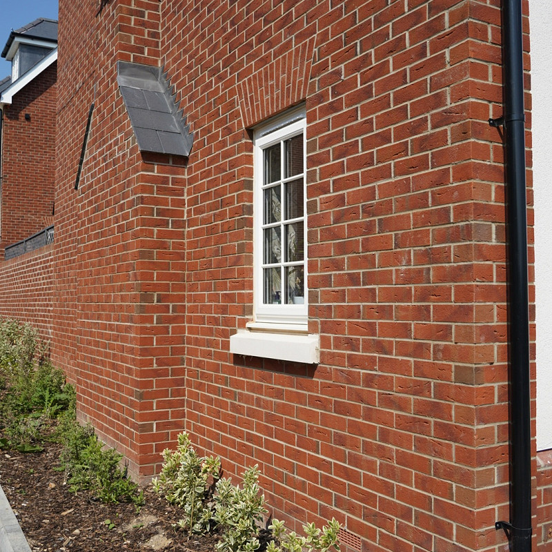 red wirecut brick wall.