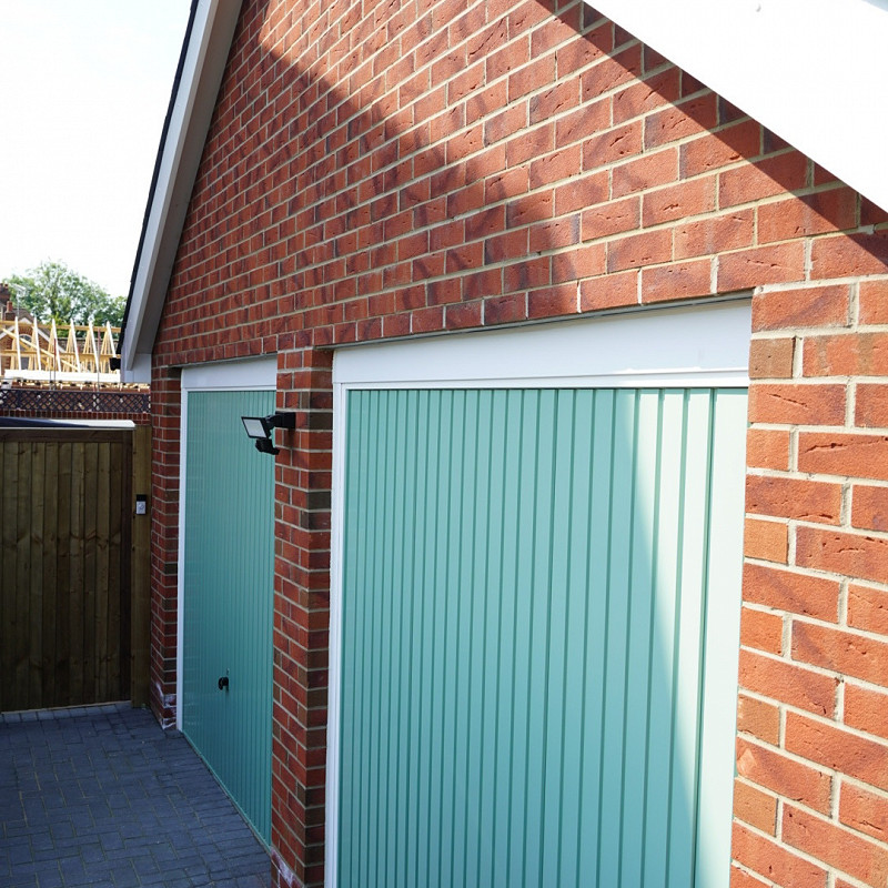Garages constructed in the Ramecroix red wirecut brick.