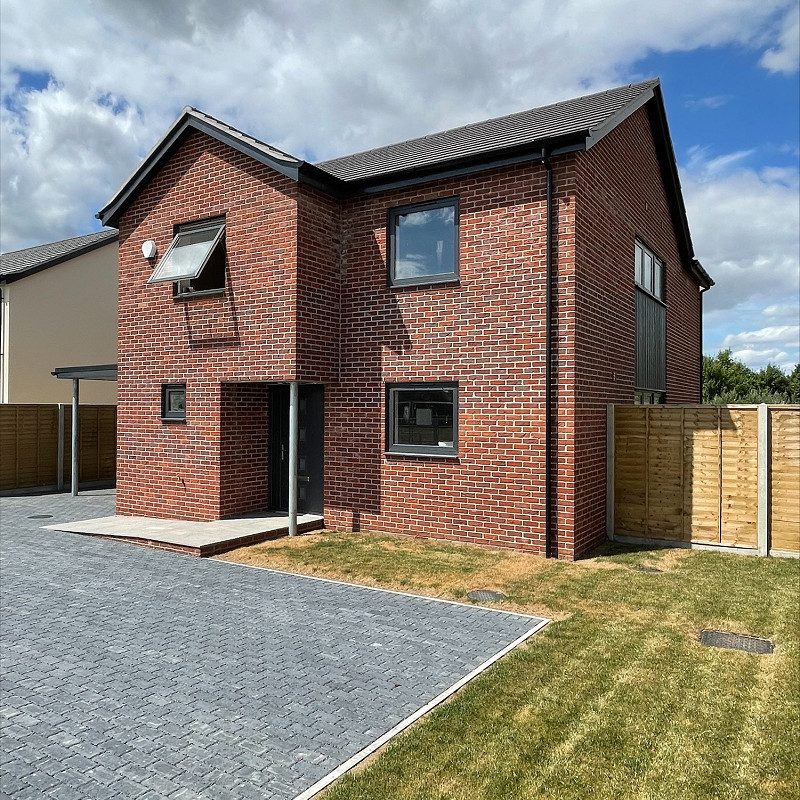 Self build housing project, constructed in the Wimbledon Red Mixture brick.